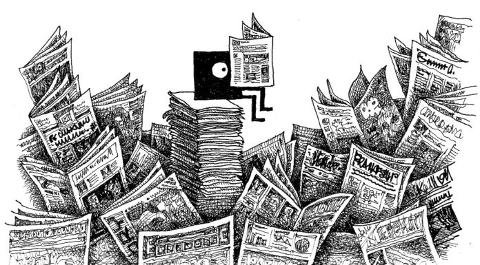 Bidule lisant des journaux