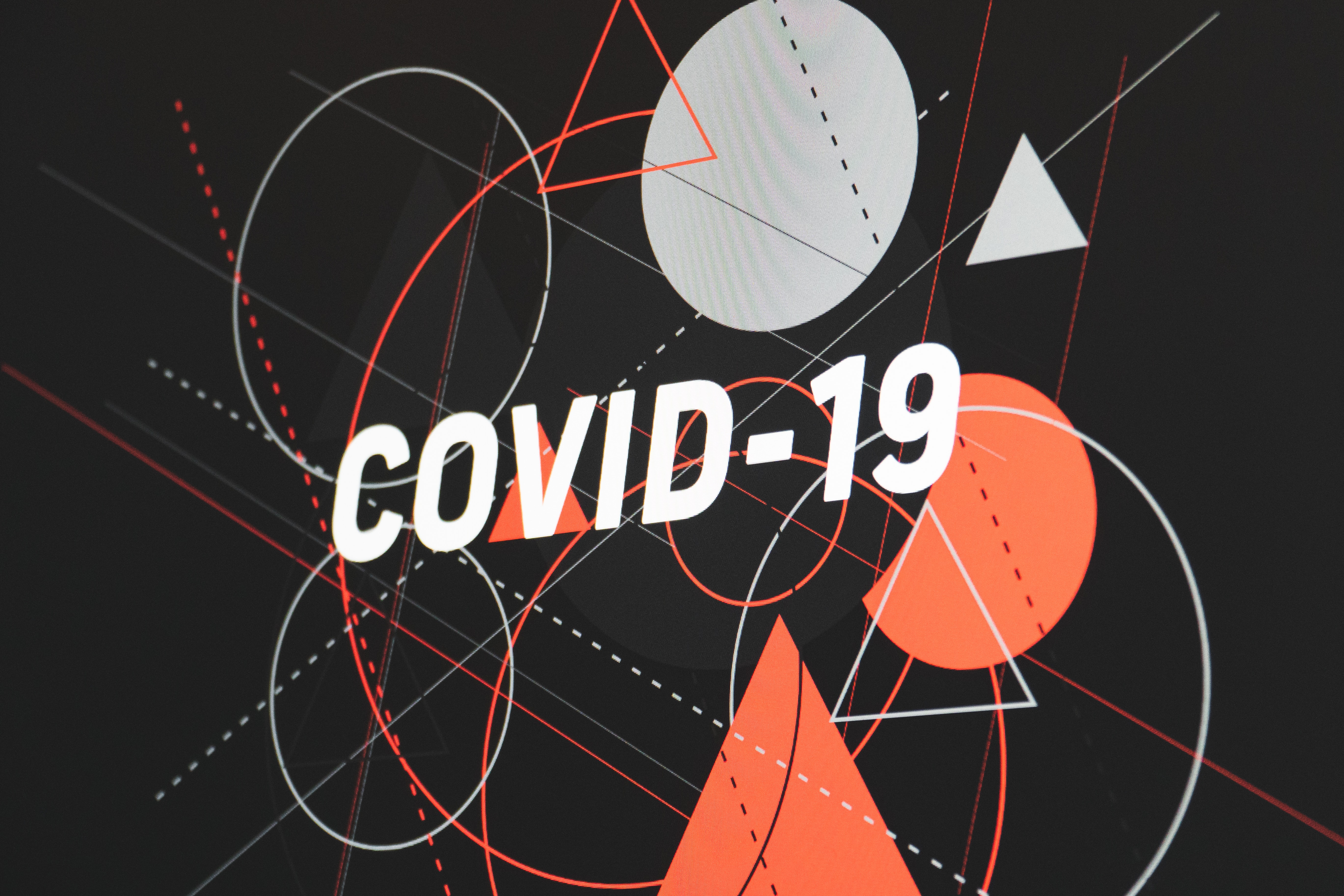 Figures géométriques évoquant le coronavirus, avec le texte "Covid-19"