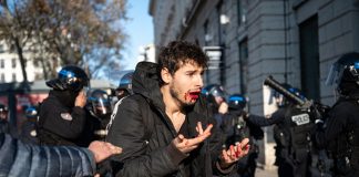 FRANCE – ARTHUR NACIRI POLICE ASSAULT DURING RETIREMENT REFORM DEMONSTRATION IN LYON